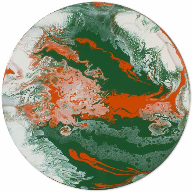 Circular art in orange green and white enamel
